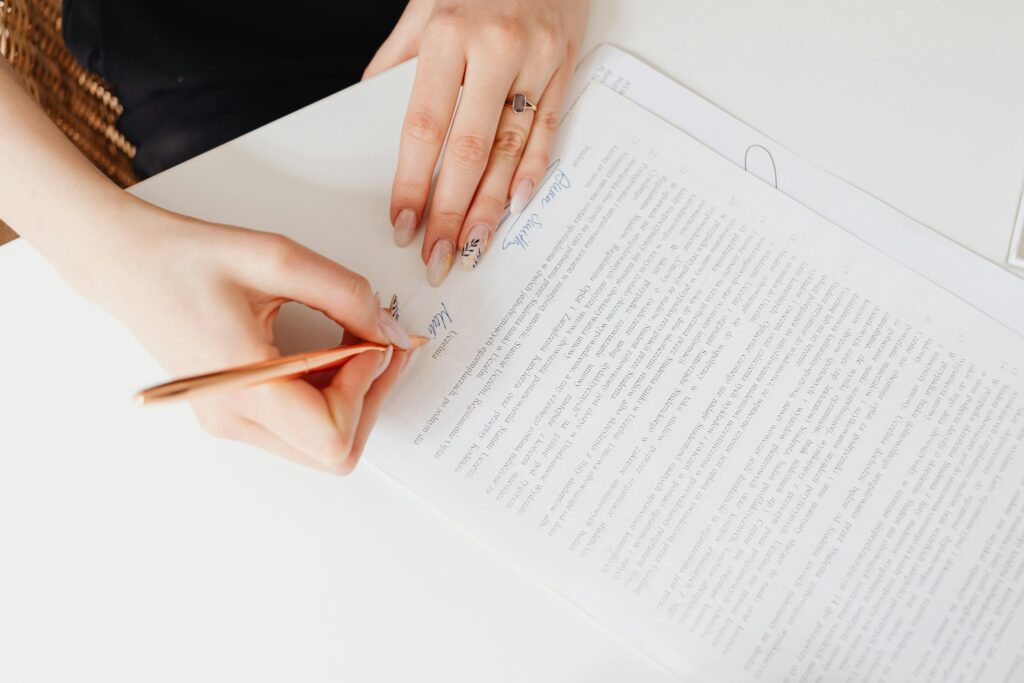 A woman signing a legal document