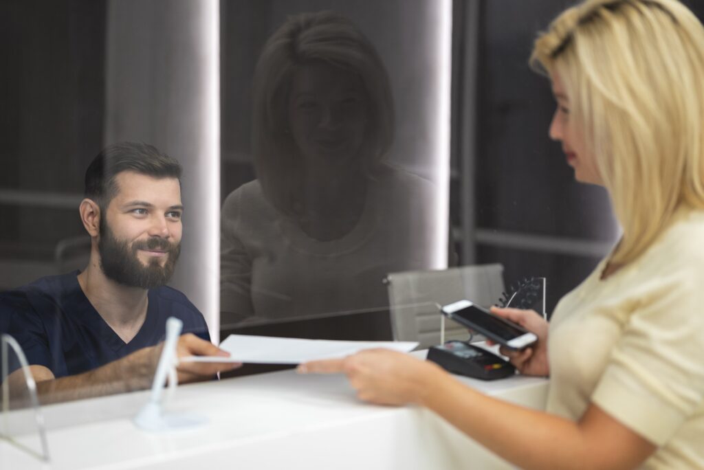 A bank teller helping a customer
